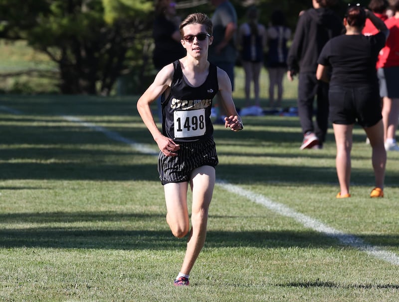 Sycamore’s Logan Jones finishes his race Tuesday, Sept. 3, 2024, during the Sycamore Cross Country Invite at Kishwaukee College in Malta.