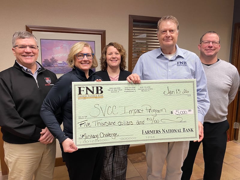 Sauk Valley Community College’s Impact Program announced the Mustang Impact Challenge has received a $5,000 gift from Farmers National Bank. Pictured are Ken Burn, Sauk Valley Community College (from left); Kim Ewoldsen, Sauk Valley Community College; Angie Erickson,  Farmers National Bank; Doug Vanderlaan,  Farmers National Bank; and Joe Robbins, Morrison Schools.