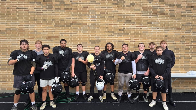 Dixon senior running back Landon Knigge, center, is pictured with his offensive linemen and the Friday Night Drive Team of the Week MVP belt after winning the award. 

Pictured, left to right, are Evan Schier, Liam Withrow, Dre Diaz, Isaiah Chattic, Chase Simpson, Landon Knigge, Dylan Bopes, Owen LeSage, Reid Whitcombe, Jordan Moore, Brayden Smice and Blake Dingley.