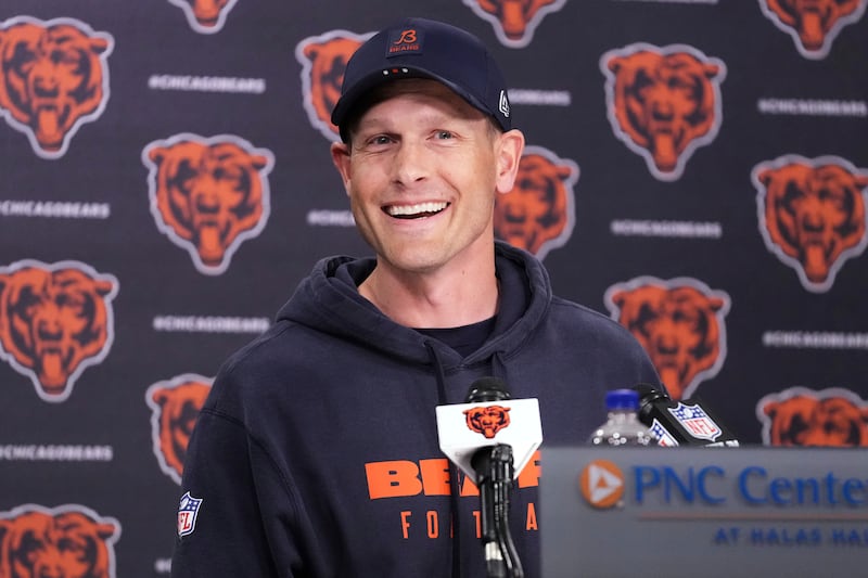 Chicago Bears head coach Ben Johnson smiles as he talks to media at a news conference after NFL football practice in Lake Forest, Ill., Wednesday, May 21, 2025. (AP Photo/Nam Y. Huh)