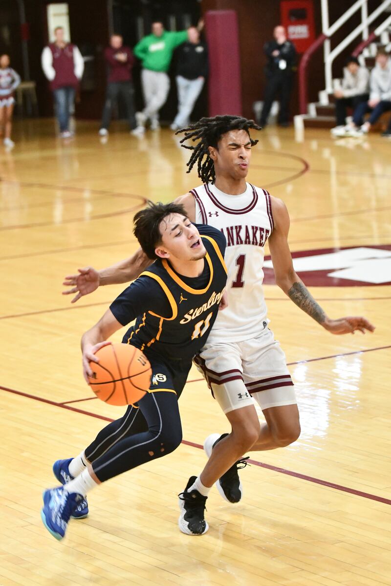 Sterling's Nico Battaglia drives against Kankakee's Lincoln Williams during the Kays' 85-50 victory over Sterling in the IHSA Class 3A Morris Regional championship on Friday, Feb. 28.