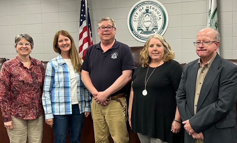 The Mendota City Council proclaimed Monday, May 19, 2025, that Mendota is now a "dementia-friendly city," recognizing the growing prevalence of dementia. Mayor David Boelk (center) poses with members of the Dementia Friendly Mendota Group (from left) Pastor Elise Rothfusz, Amy Brewer, Annie Short and Pastor Jeff Brace.