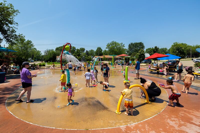 The Water Wonderland splash pad in Dixon was jammed with people looking for a place to cool off Wednesday, June 11, 2025.