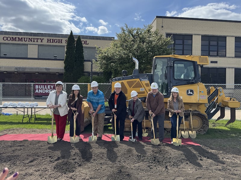 The Morris Community High School Board breaks ground on the $67 million school addition on Wednesday, May 6, 2026. Pictured from left to write: Kim Struck, Chrissy Burgess, Chris Danek, Superintendent Craig Ortiz, Judy Miller, Scot Hastings, and Lynn Vermillion. Not pictured: Matt Eber.