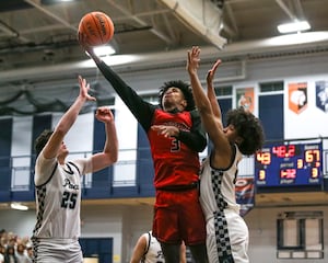 Photos: Bolingbrook vs. Oswego East boys basketball
