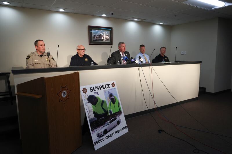 Kankakee County Sheriff Mike Downey, center, leads a press conference on Tuesday, Feb. 3, 2026, to share security footage visuals of a suspect and vehicle as they 
investigate a homicide that occurred on Feb. 2 at The Line, a bar along Illinois Route 114 in Momence. Bar owner Courtney Drysdale was found shot to death on Monday, Feb. 2, 2026, at the establishment.