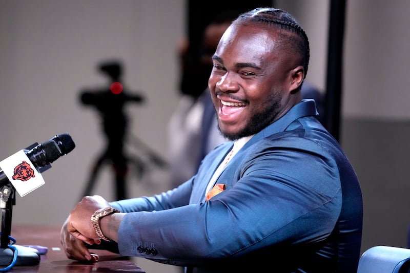 Chicago Bears defensive tackle Grady Jarrett smiles as he talks to media during a news conference at Halas Hall in Lake Forest, Ill., Wednesday, March 12, 2025. (AP Photo/Nam Y. Huh)