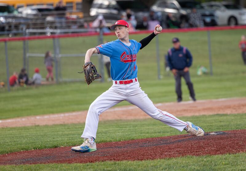 Oregon’s Bryce Becker fires a pitch against Rock Falls in the Stillman Valley Class 2A Regional semifinal Thursday, May 22, 2025.