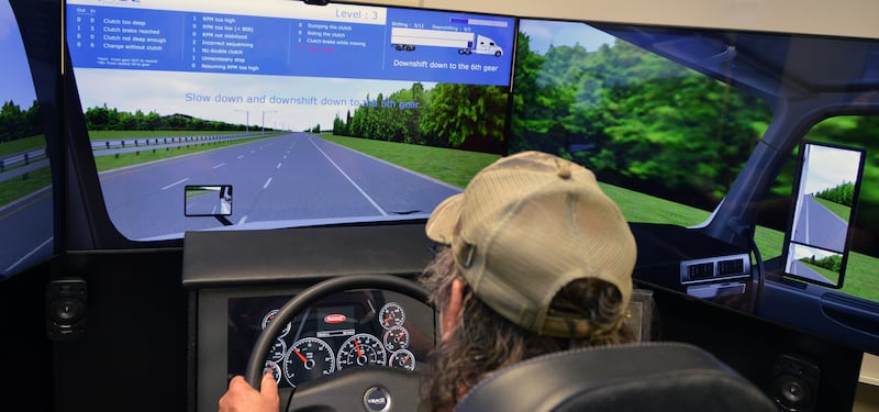 Richard Molln, an Illinois Valley Community College truck driver trainer, practices highway driving on one of the Truck Driver Training Program’s new simulators. The new equipment, purchased with a grant from the state Community College Board, will be on display during the program’s open house on Thursday, along with the fleet of semi-trucks and the classroom facility.