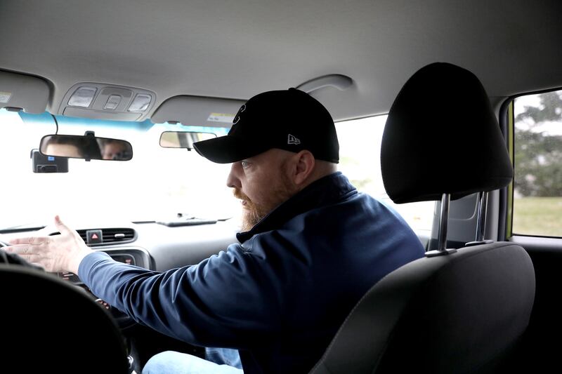 Rich LaTart, a driving instructor at the Geneva Top Driver location, teaches a lesson on the road with a student.