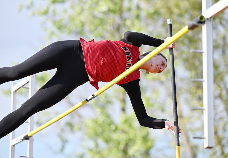 Huntley's Emma Garofalo clears the bar while competing in pole vault during the 48th annual Tiger Girls Track and Field Invitational at Wheaton Warrenville South High School in Wheaton on Friday, May 1, 2026.