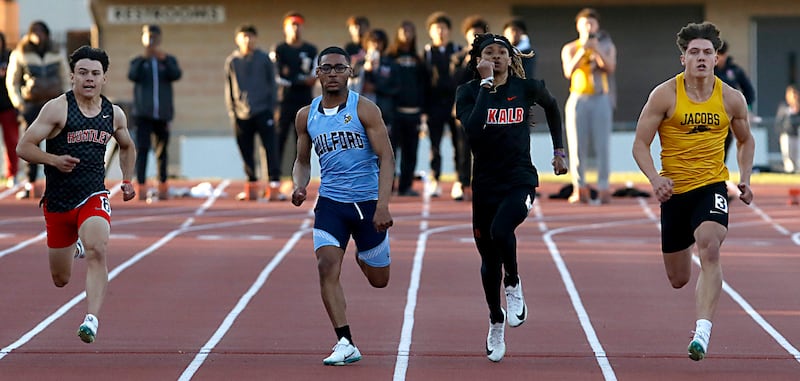 Huntley’s Vincent Costa, Guilford.’s Alexanderr Perry, DeKalb’s Braylen Anderson and Jacobs’ Matt Scardina compete in the 100 meter dash during the Huntley IHSA Class 3A Boys Sectional Track and Field Meet on Thursday, May 22, 2025, at Huntley High School.