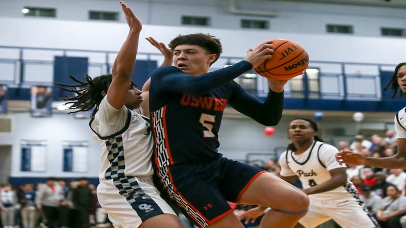 Photos: Oswego vs. Oswego East boys basketball