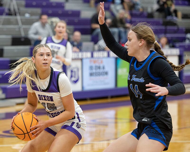 Dixon’s Morgan Hargrave looks to make a play against St. Francis’ Hannah Grivetti Saturday, Jan. 10, 2026.