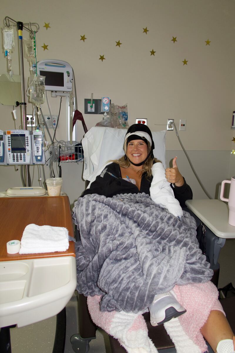 Taylor Keegan is shown at her second round of chemotherapy. The Crystal Lake woman will "ring the bell" to signify the end of her treatment on Sunday, Oct. 18, 2025, during the Real Bears Fans Wear Pink event at Soldier Field.