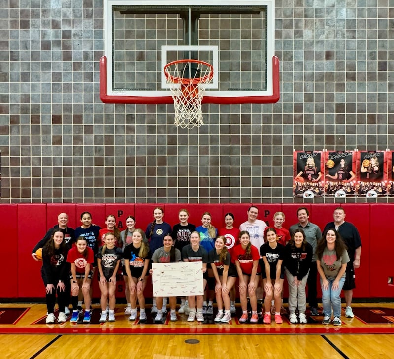 The Erie-Prophetstown Girls Basketball team and coaches helped pull the entire Hoops for Heart event together with their donations and support.