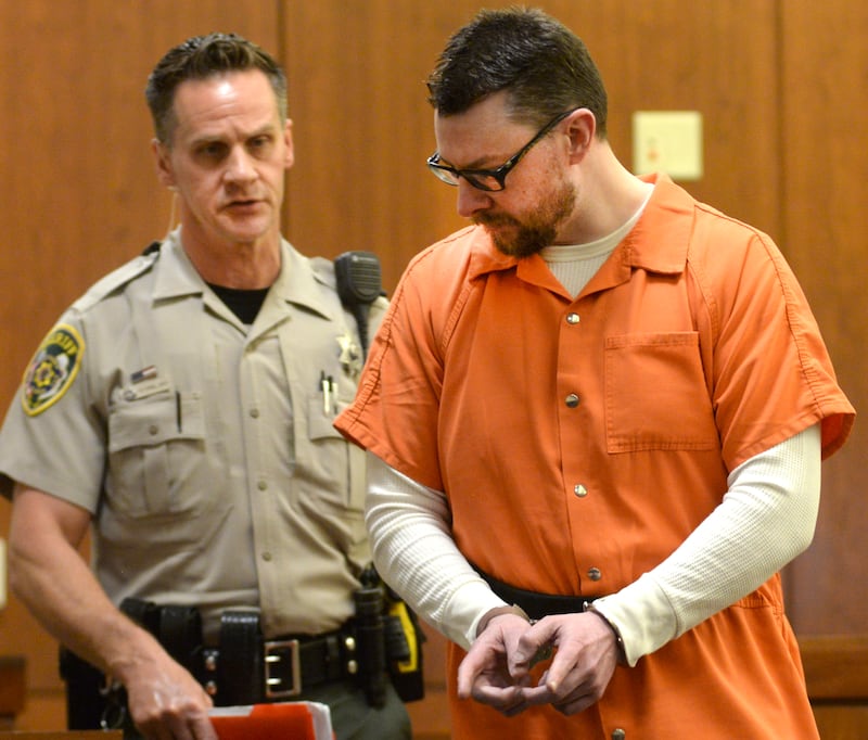 Duane Meyer is escorted into an Ogle County courtroom by Deputy Dan Daub for a motion in limine hearing on Friday, June 27, 2024. Meyer is charged with killing his ex-wife Maggie Rosko Meyer and their 3-year-old son in 2016.