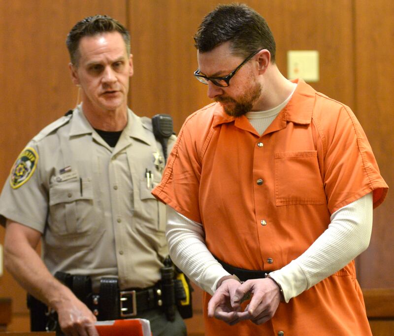 Duane Meyer is escorted into an Ogle County courtroom by Deputy Dan Daub for a motion in limine hearing on Friday, June 27, 2024. Meyer is charged with killing his ex-wife Maggie Rosko Meyer and their 3-year-old son in 2016.