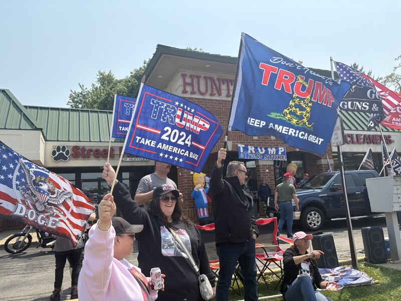 People rally in front of the Trump and Truth Store in Huntley May 31, 2025.