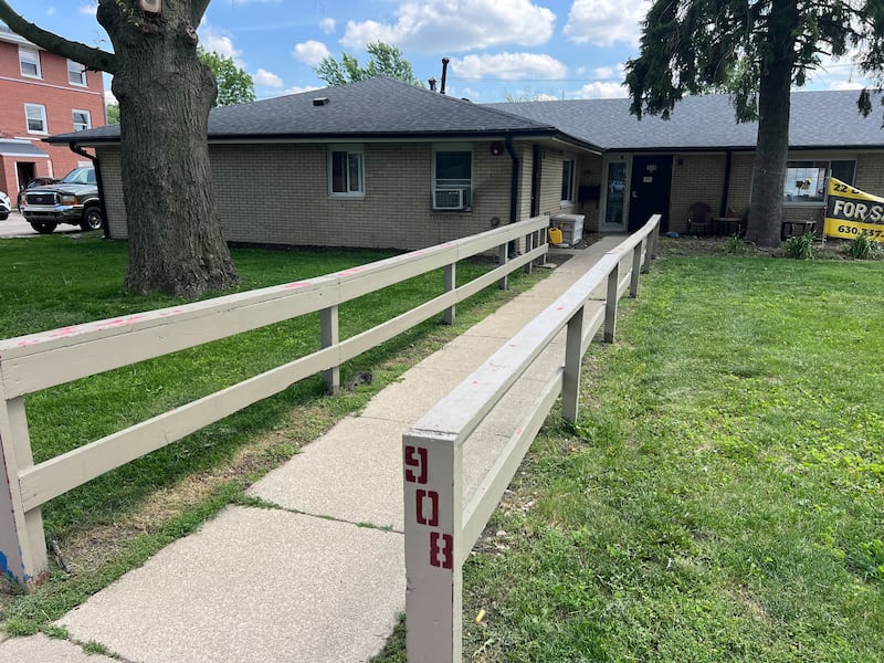 The walkway post of 908 Greenbrier Road, DeKalb, on Tuesday, June 17, 2025. A fire started in the early morning in a bathroom, leaving the building uninhabitable, injuring one person and displacing 16 residents, authorities said.