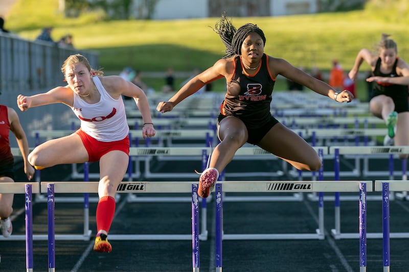 Oregon’s Jillian Hammer (left) just edges Byron’s Malia Morton Thursday, May 8, 2025, during the girls Big Northern Conference track meet.