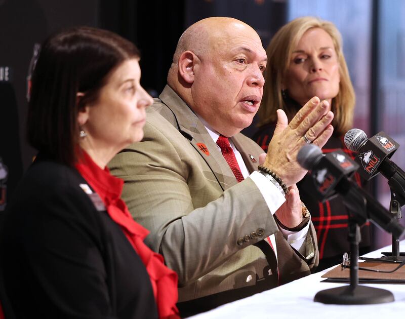 Northern Illinois University Vice President and Director of Athletics, and Recreation, Sean Frazier, speaks as NIU President Lisa Freeman (left) and Horizon League Commissioner Julie Roe Lach look on during a press conference Thursday, Feb. 27, 2025, at the Convocation Center to announce that NIU will be joining the Horizon League starting with the fall 2026 season for most sports other than football.