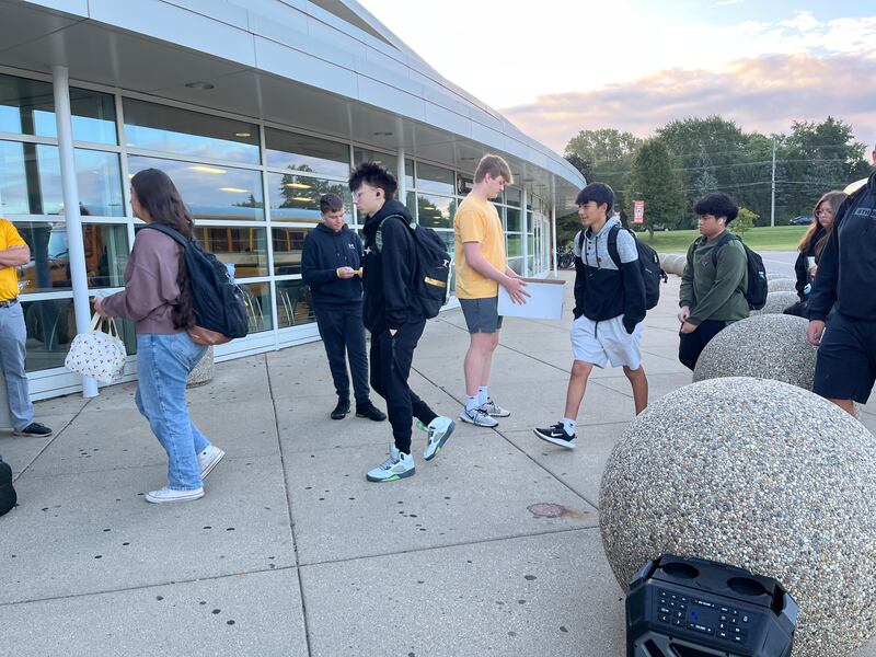 Jaxon Peterson, center back, helped hand out bracelets for childhood cancer awareness month on Thursday, Sept. 25,  2025, at at McHenry High School. Jaxon was diagnosed with B cell leukemia in 2023, as he entered 8th grade.