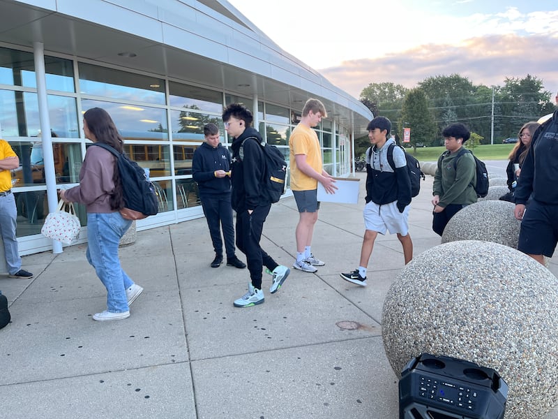 Jaxon Peterson, center back, helped hand out bracelets for childhood cancer awareness month on Thursday, Sept. 25,  2025, at at McHenry High School. Jaxon was diagnosed with B cell leukemia in 2023, as he entered 8th grade.