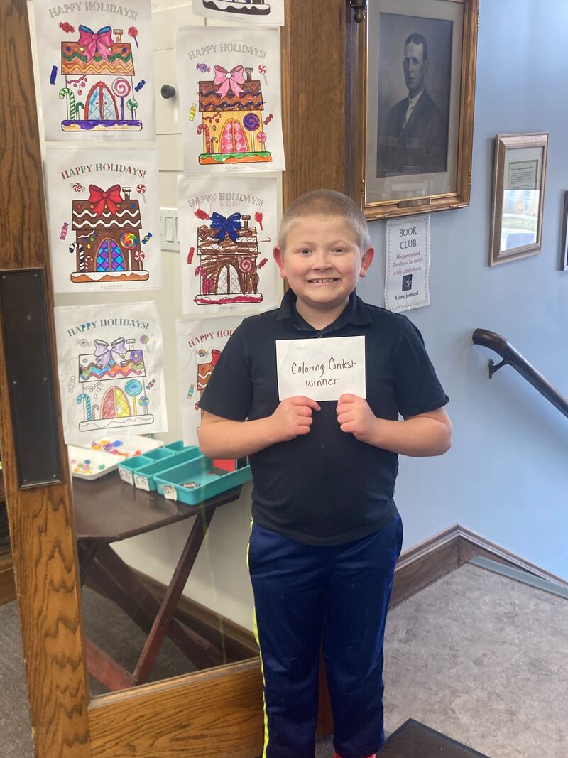 Ethan Richards was named the winner of the Christmas Coloring Contest contest at Phophetstown's Henry C. Adams Memorial Library and his prize was a gift certificate to Scoops Ice Cream and Grill.