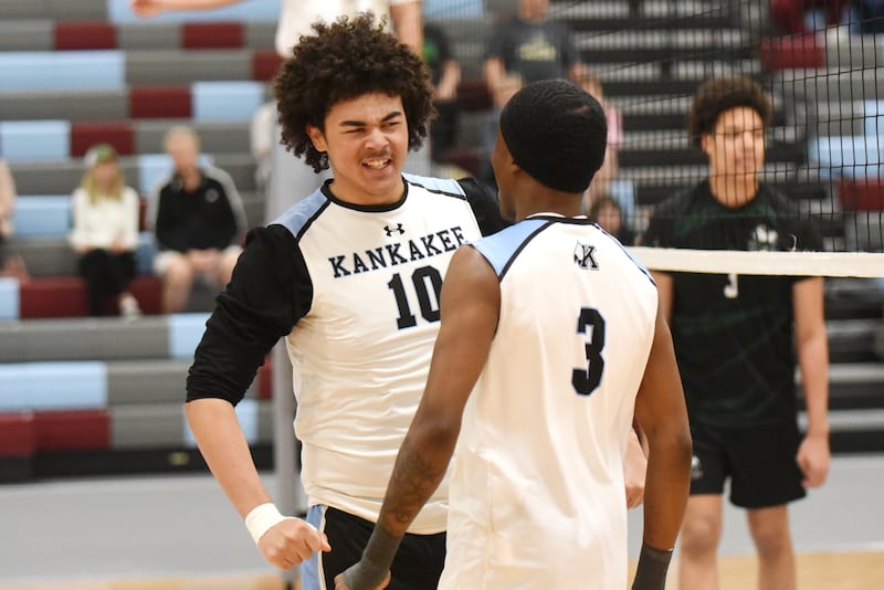 Kankakee's Aidan Lidell, left, celebrates with Jamon Barlow after a point late in the second set of the Kays' 2-0 win over Bishop McNamara at home Tuesday, March 31, 2026.