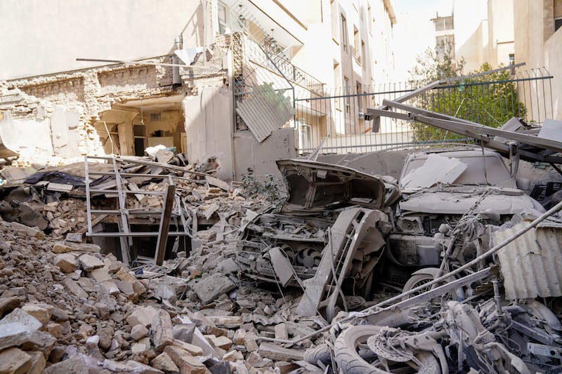 Rubble remains in the aftermath of an Israeli-U.S. strike in Tehran, Iran, Saturday, Feb. 28, 2026. (AP Photo/Amir Kholousi, ISNA)
