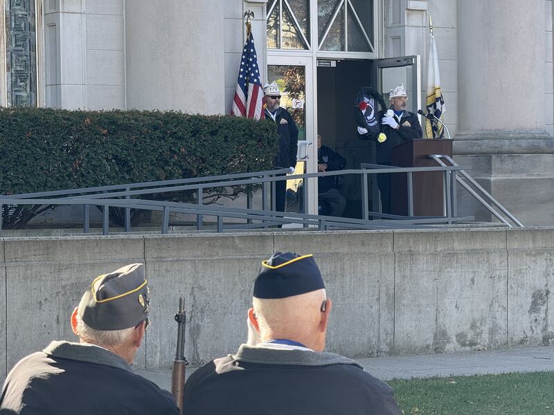 Jerry Terando presents the POW MIA wreath to the crowd at the Veterans Day ceremony on Monday.