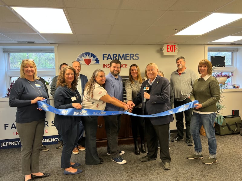 The Batavia Chamber of Commerce celebrating Jeffrey Cesario Insurance Agency's new location