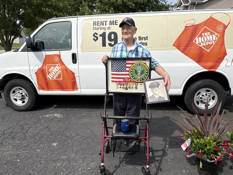 Veteran Ben Jankowski shows off medals from his military service and a picture of him in basic training June 6, 2025.