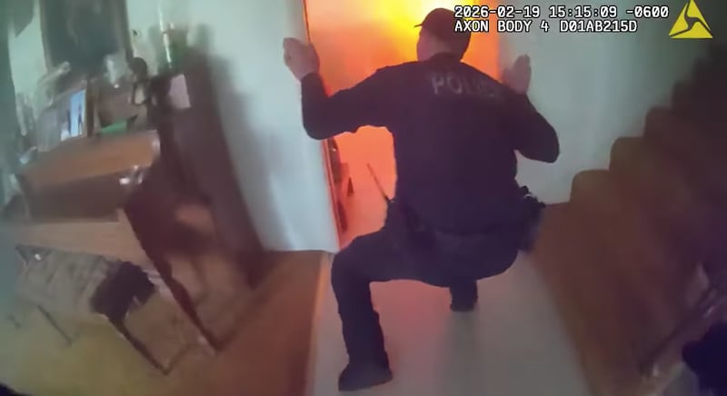 A still taken from body-worn camera footage of Crystal Lake police officers responding to a house fire on Feb. 19, 2026.