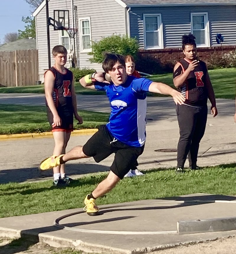 Princeton's Landen Hoffman makes the winning toss in the shot put in Monday's Ferris Family Invite at Princeton. He also won the discus.