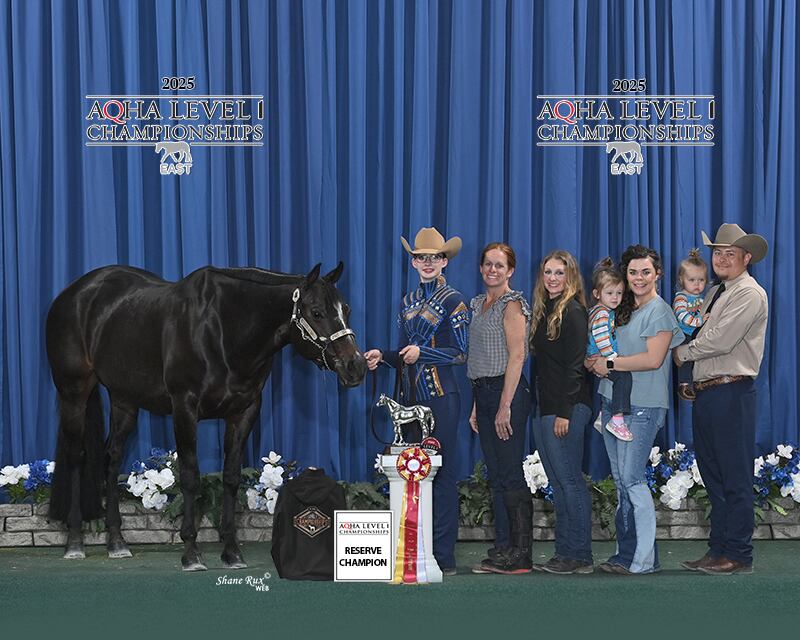June Drinkall and her family celebrate her wins at the 2025 American Quarter Horse Association Level 1 World Championship Show held last month in Wilmington, Ohio.