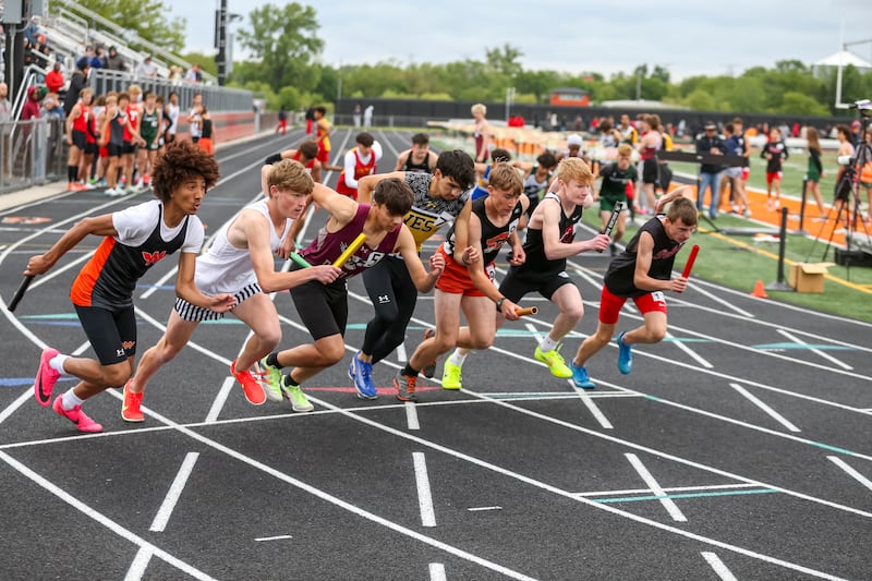 Runners start in the 4x800m at the Class 3A Minooka Sectional Boys Track and Field Meet Wednesday, May 21, 2025 in Minooka.