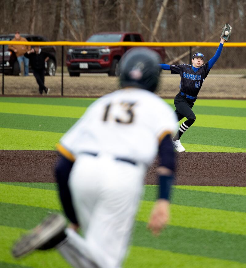 Newman’s Jameson Hanlon snags a liner at second base off the bat of Sterling’s Wyatt Cassens Tuesday, March 18, 2025.