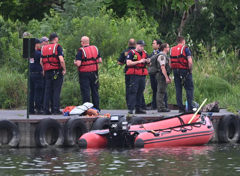 Search crews stage at Boy Scout Island across the Fox River from Pottawatomie Park in St. Charles as  search continues Wednesday, July 30, 2025 for a missing kayaker.