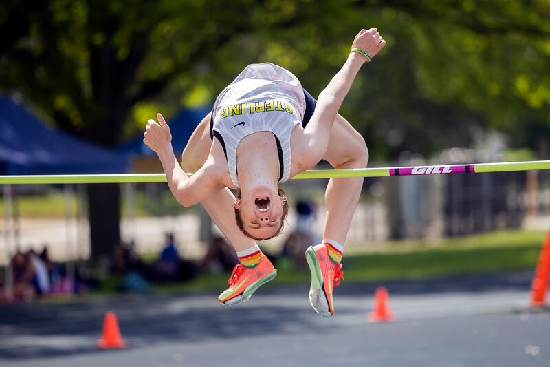 Sterling’s Abby Ryan clears the bar in the high jump to qualify for state Wednesday, May 14, 2025, during Sectionals at Sterling High School.