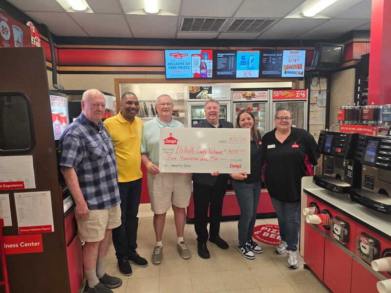 Casey’s General Store staff, including Regional Director Sam Woodard, District Manager Patty Leonard, and Store Manager Michelle Pfeifer, along with DeKalb veteran Jerry Smith, co-chair of the DeKalb County Veterans Recognition Fund; Paul Jerde, DeKalb County Community Foundation board member and foundation Executive Director Dan Templin, pose for a photo on May 16, 2025, after Casey's donated $5,000 to the veterans charitable fund. The money came from the store's winnings after a $349 million Illinois Mega Millions Lottery ticket was sold at the store on March 25, 2025, in Cortland.