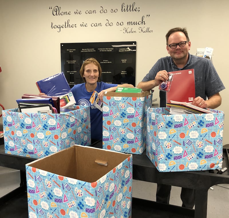 Karen Nall (left) with Eric Fisher, the executive director of We Care of Grundy County.