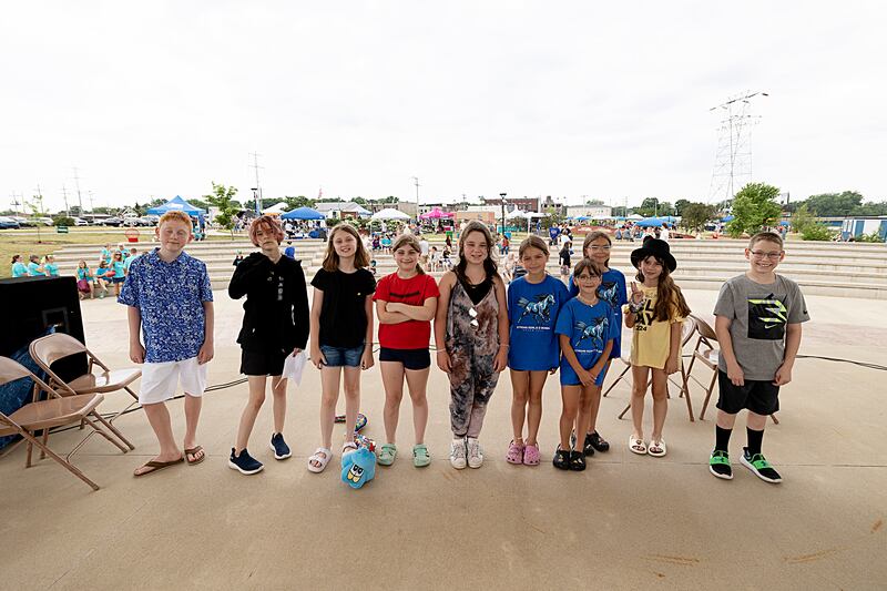 Woodlawn Arts Academy acting students put on a performance of skits and poetry Saturday, June 22, 2024 at Rock Falls’ Summer Splash. Performers are Thomas Vaugh (left), 11, Sam Jensen, 12, Gen Billiet, 11, Juliette O’Brien, 9, Mia Schultz, 10, Gracie Pettinger, 10, Kaila Hernandez, 8, Maiya Hernandez, 10, Elsie Beer, 9, and Dylan McNitt, 12.