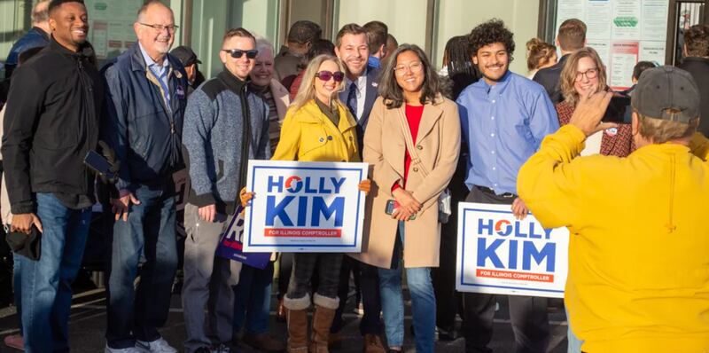 Lake County Treasurer Holly Kim stands with supporters outside the Illinois State Board of Elections in Springfield on petition filing day on Oct. 27, 2025.