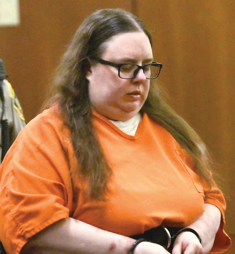 Sarah Safranek is escorted into a courtoom at the Ogle County Judicial Center on Wednesday, Oct. 29, 2025 for a pretrial hearing. She is charged with killing her 7-year-old son in 2021.