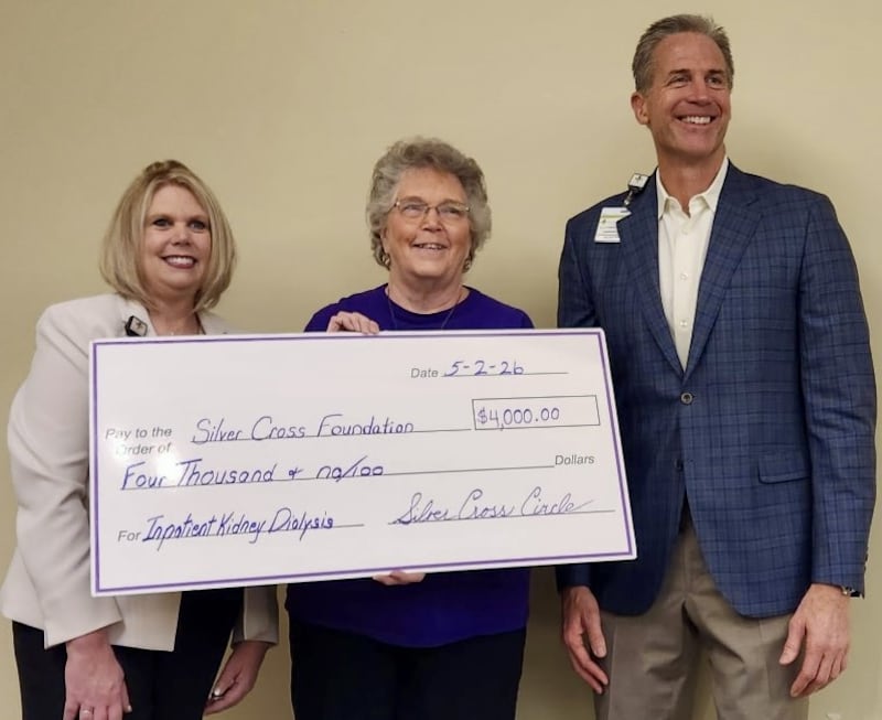Rita Larson, past co-president of the King’s Daughters and Sons Silver Belles Circle (center), presents a $4,000 donation dated May 2, 2026, in support of acute dialysis care at Silver Cross Hospital to Tracy Simons, executive director of the Silver Cross Foundation (left), and Scott Paddock, senior vice president of external affairs at Silver Cross Hospital.
