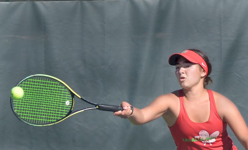 La Salle Peru junior Grace Pecchio hits a shot during the singles third-place match of Saturday's Class 1A Ottawa Sectional at the Henderson-Guenther Tennis Facility.