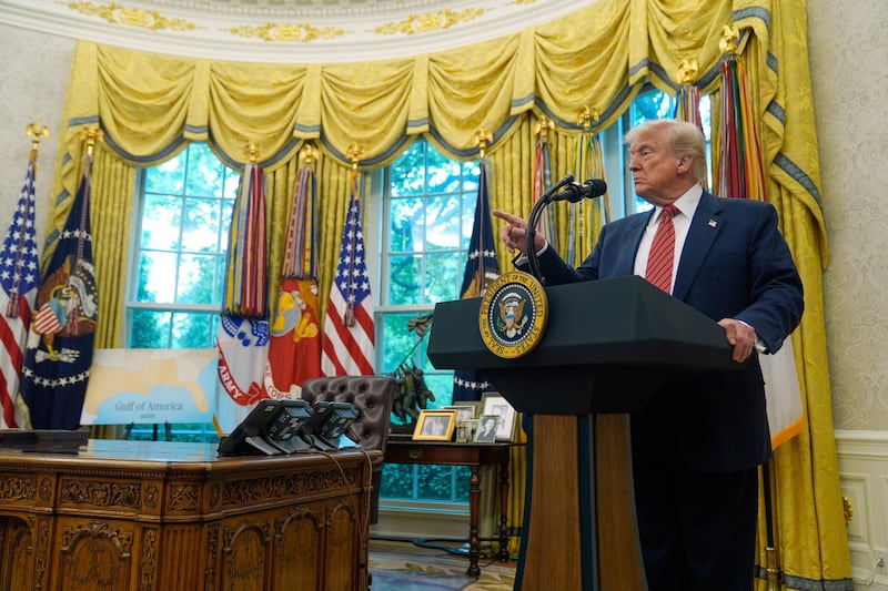 President Donald Trump speaks to reporters after David Perdue was sworn in as U.S. Ambassador to China during a ceremony in the Oval Office of the White House, Wednesday, May 7, 2025, in Washington. (AP Photo/Mark Schiefelbein)