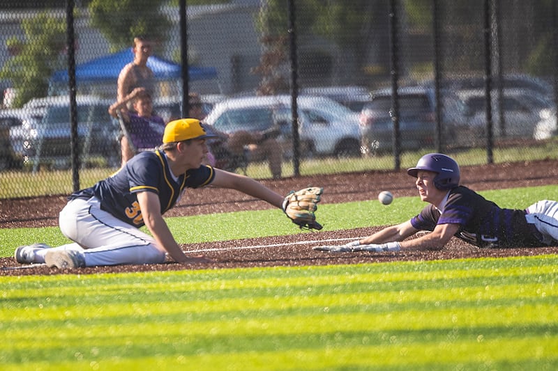 Dixon’s Jagger Kemp avoids a tag at third for a triple against Sterling Wednesday, May 27, 2026, at the Class 3A Sterling baseball regional.